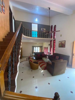 Cheerful 3- bhk villa with terrace and a balcony.